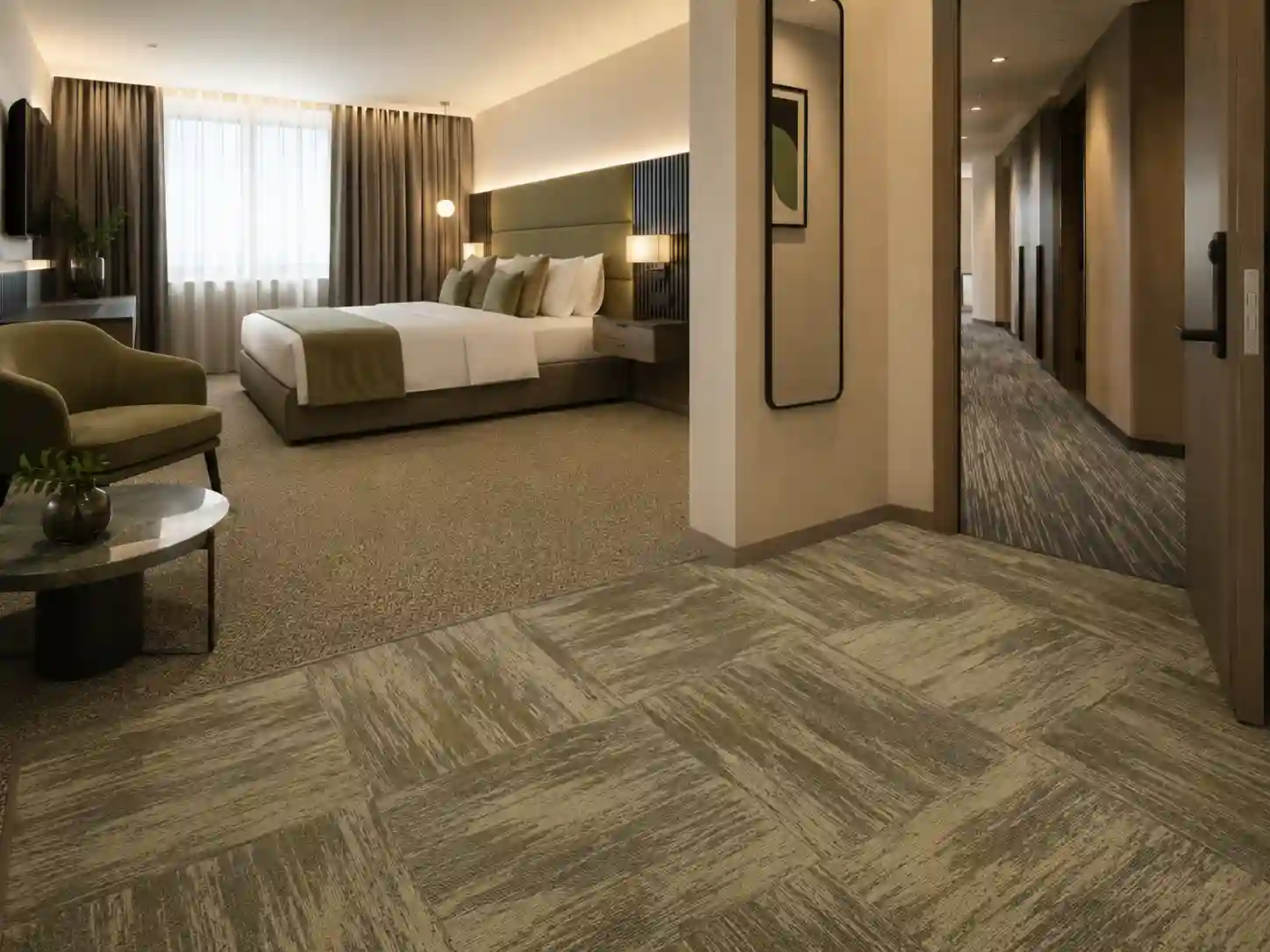 Koordynowane wykładziny zastosowane w pokoju, korytarzu i lobby hotelowym.